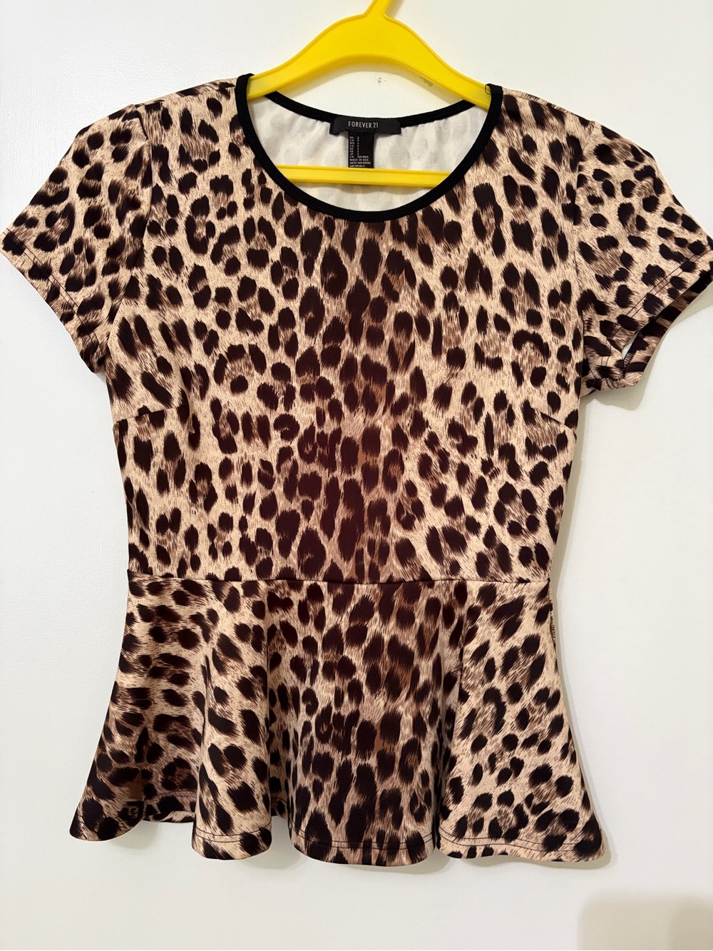 Forever 21 leopard Short Sleeve peplum top - size Small
